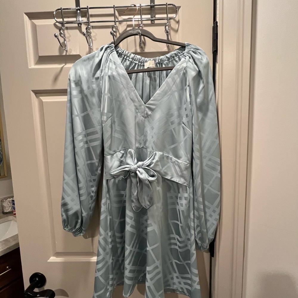 Elegant Light Blue Dress with Bow Detail